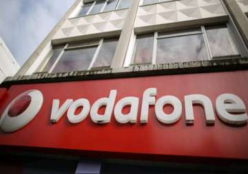 vodafone group may sell stake in bharti to comply with rules