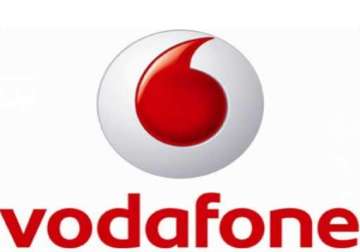 vodafone agrees to buy spanish network