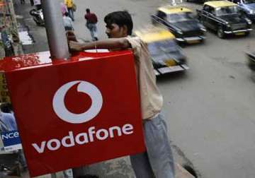 vodafone describes rs 11 000 cr tax as unjust