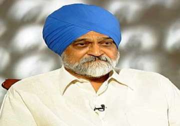 worst is over for rupee 60 65 per dollar fair value montek singh ahluwalia