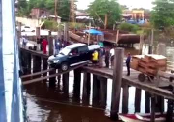 car boarding on a ship using a plank video