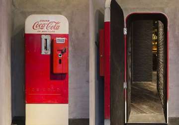 searching for a bar drink your way into this coca cola vending machine