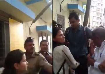 mumbai policeman remains mute spectator as girl kicks old man for clicking her pics