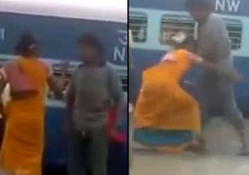 watch the woman showing hardcore wwe skills on the railway platform