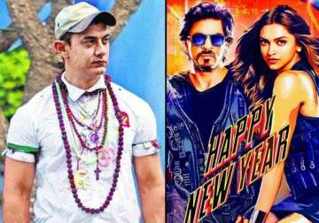 aamir vs shah rukh pk s promotions to affect happy new year s success at box office see pics