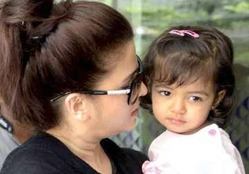 aaradhya introduced to writing on saraswati puja