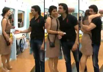 bigg boss armaan returns in the main house tanisha gives a tight hug view pics