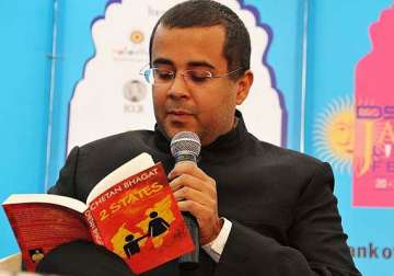 chetan bhagat hitting the right notes with bollywood see pics