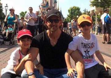 hrithik roshan s day out with kids hrehaan and hridhaan in disneyland view pics