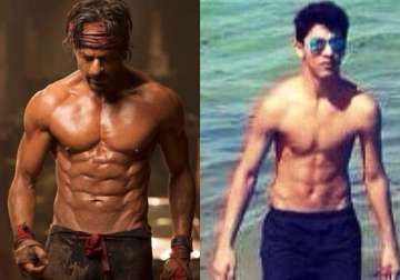 papa shah rukh khan faces fierce competition from son aryan