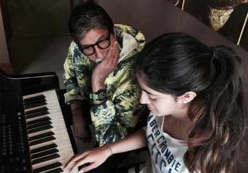 amitabh bachchan surprised with granddaughter s musical talent