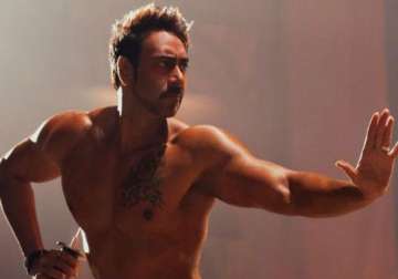 action jackson first look out ajay devgn flaunts his masculine body view pics