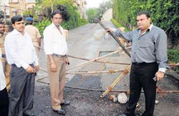 srk s neighbours up in arms over road barricade in bandra