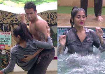 bigg boss 9 all inmates unite against rimi sen throw her in the swimming pool watch video