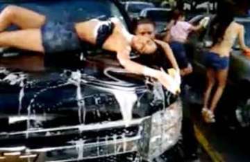 mallika washes car in love barack barely dressed