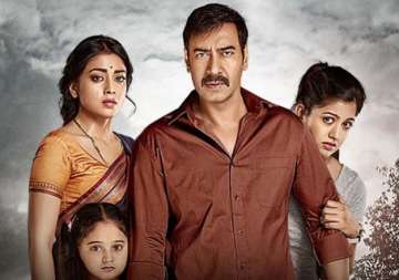 drishyam movie review a promising thriller weakened by ajay s wooden acting