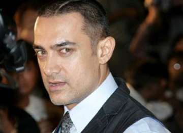 aamir gets his head shaved for his next film