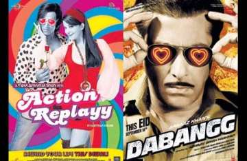 stars wear hearts on their glares in dabangg and action replayy posters