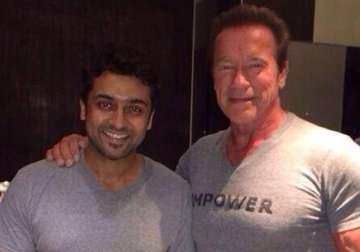 surya meets his fitness idol arnold schwarzenegger