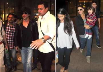 shah rukh khan and family spotted at mumbai airport on return from dubai
