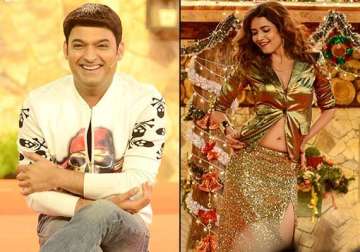 bigg boss 8 turns hilarious and hot kapil sharma heats the stage with karishma sonali and dimpy