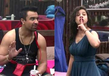 bigg boss 8 halla bol day 2 sambhavna hurls shoe at dimpy ajaz out of the game see pics