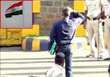 watch sanjay dutt kisses soil salutes national flag before leaving jail