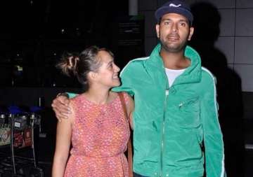 photos yuvraj singh spotted getting cosy with hazel keech at airport after engagement