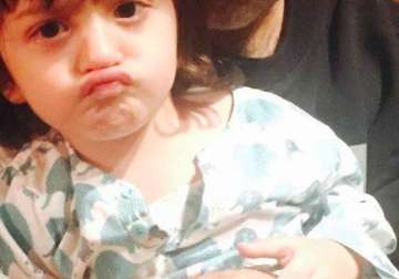 cuteness overloaded when shah rukh s son abram taught how to do a pout