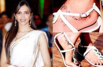 deepika sports a new tattoo this time on her ankle