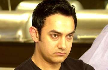 aamir down with fever on return from australia
