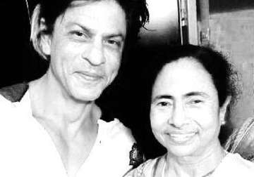 post kkr victory srk meets mamata at her residence