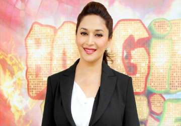 madhuri praises shah rukh salman for their devotion to work