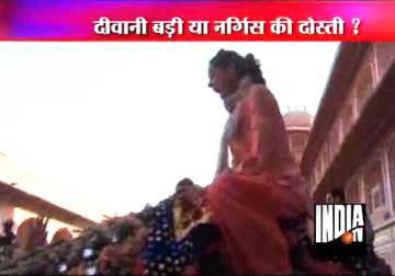 nargis fakhri screams as she rides a camel in jaipur