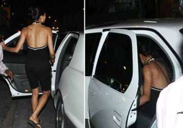 sushmita sen spotted with a mystery man tries to avoid photogs view pics