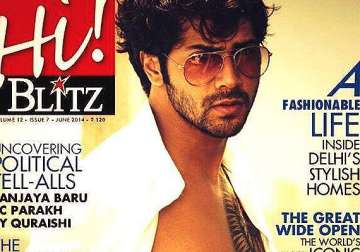 varun sheds cute image goes sexy and wild as hi blitz cover boy see pics