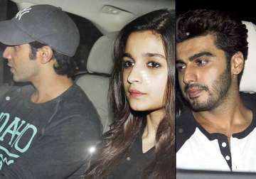 alia arrives with varun at the screening of 2 states ignores arjun see pics