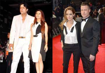 are armaan tanishaa following brad angelina arrive in similar outfits at lfw 2014 se pics