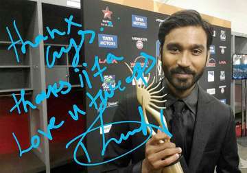 iifa 2014 dhanush grabs his first award posts picture