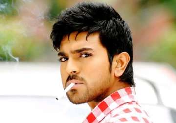 chiranjeevi s son ram charan teja lands in soup over yevadu posters