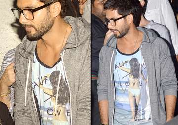 spotted shahid kapoor with a bikini clad lady over him see pics