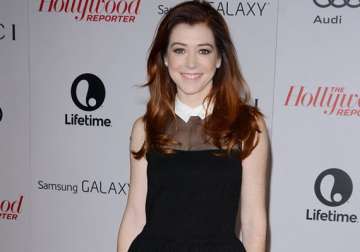 alyson hannigan joins more time with family