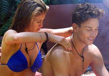 i m a celebrity.... sees ami willerton giving intimate back massage to joey essex view pics