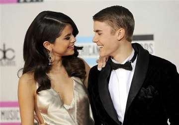 bieber s grand dad believes selena gomez is a positive influence on grandson