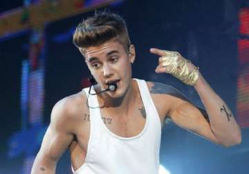 bieber to pay damages to victim of his egg assault