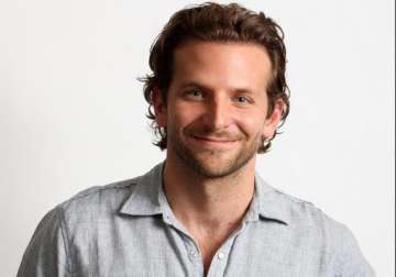 bradley cooper helps friends pay off debts