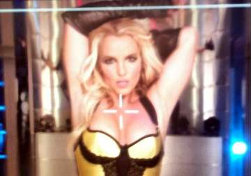 britney spears gets dirty for new music video view pics