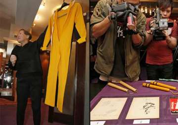 bruce lee s famous yellow jumpsuit up for auction