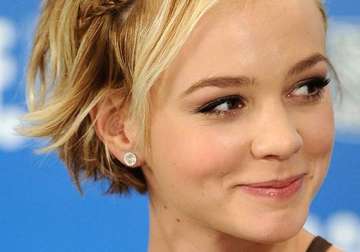carey mulligan happy to be home