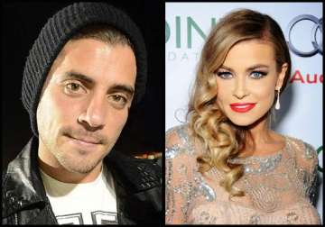 carmen electra dating clothing mogul tal cooperman